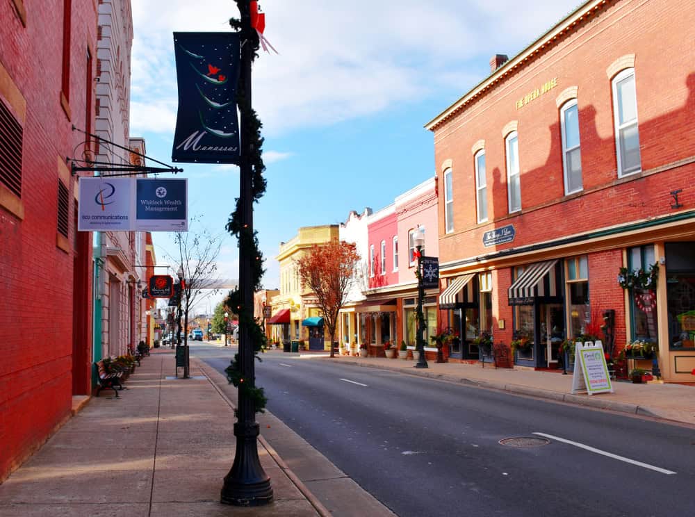 Charming downtown Manassas, Virginia, adorned for the holidays with festive decorations and vibrant storefronts.