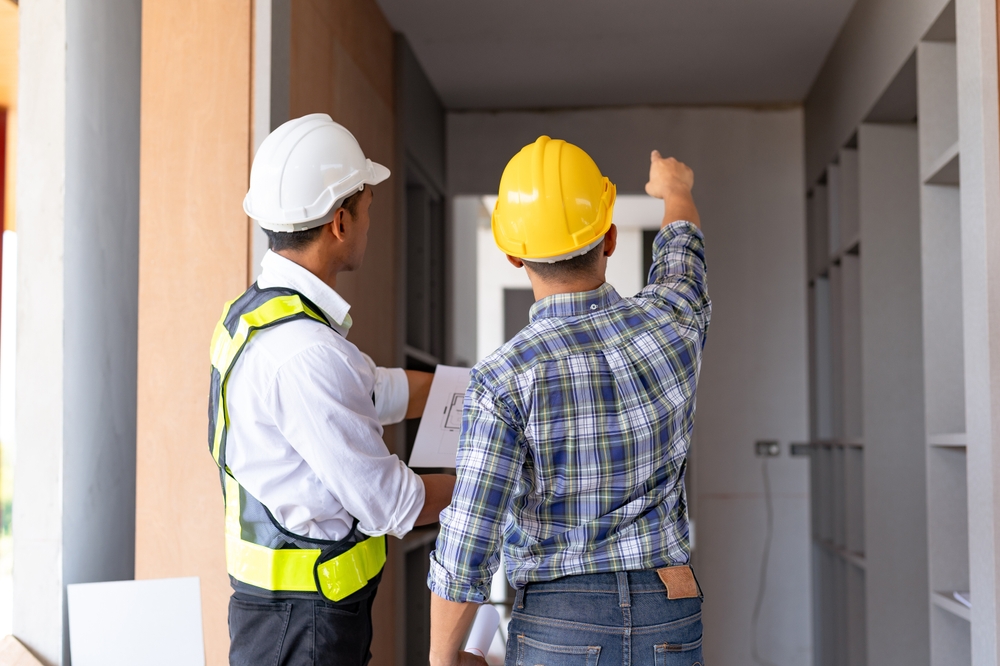 Inspector and student performing a VA home inspection