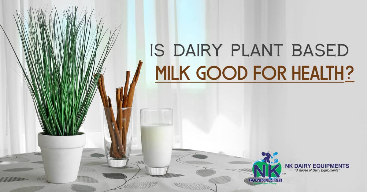 Fresh green plant and glass of milk on a table promoting dairy plant-based milk health benefits.