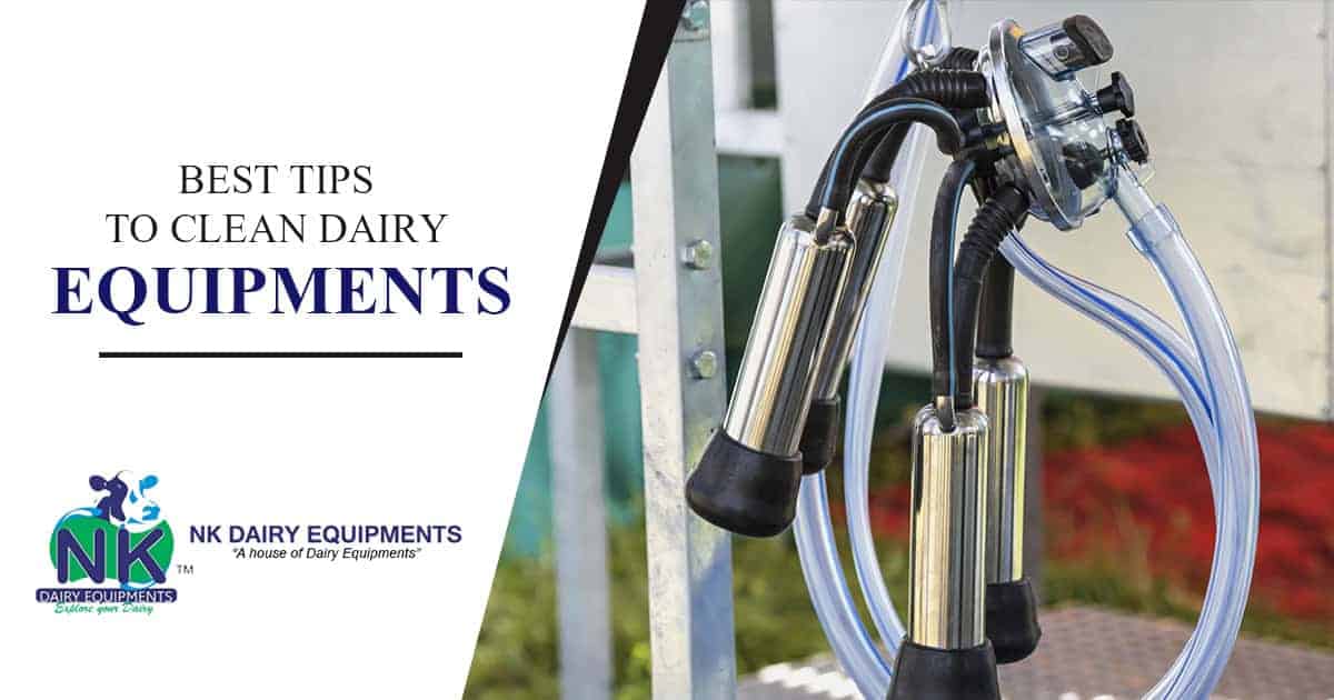 Portable milking machine for dairy farms with stainless steel components and vacuum pump.
