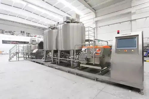High-capacity dairy processing equipment in a modern factory setting.