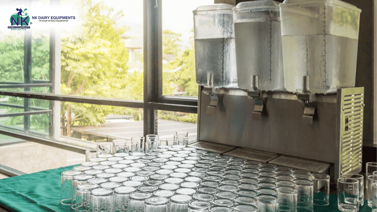 Stainless steel milk cooling and storage equipment for dairy processing.