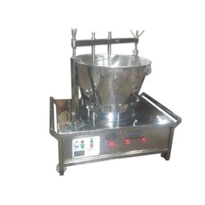 Stainless steel milk butter churning machine for dairy processing and milk fat extraction.