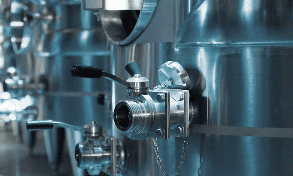 Steel dairy processing equipment for milk production and handling.