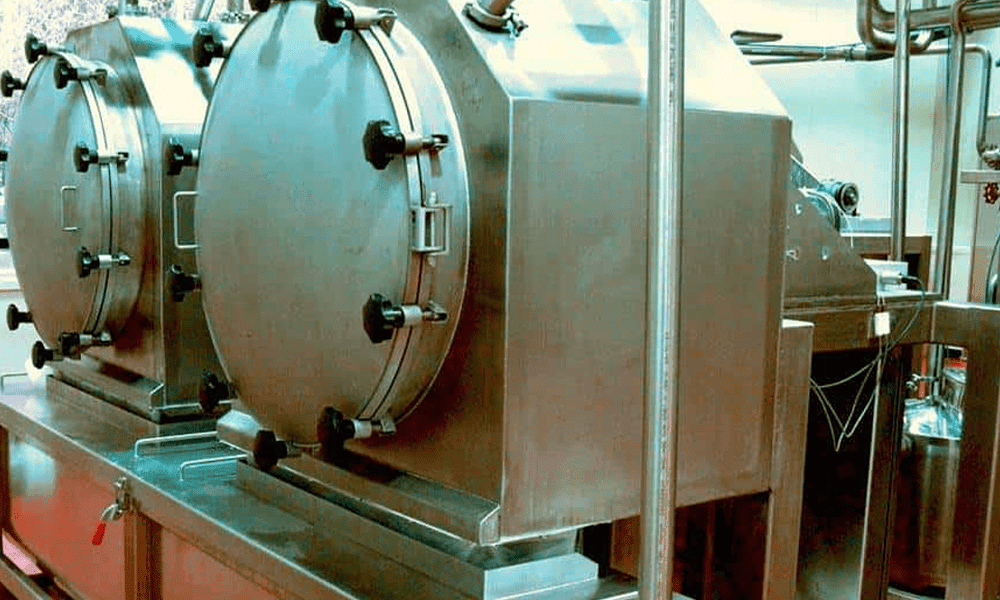 High-capacity milk pasteurizer machine for dairy processing plants.