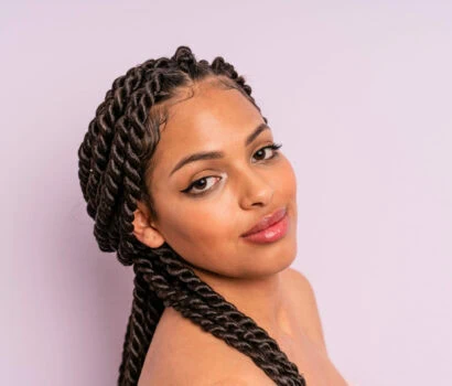 afro black woman with braids close up. beauty concept