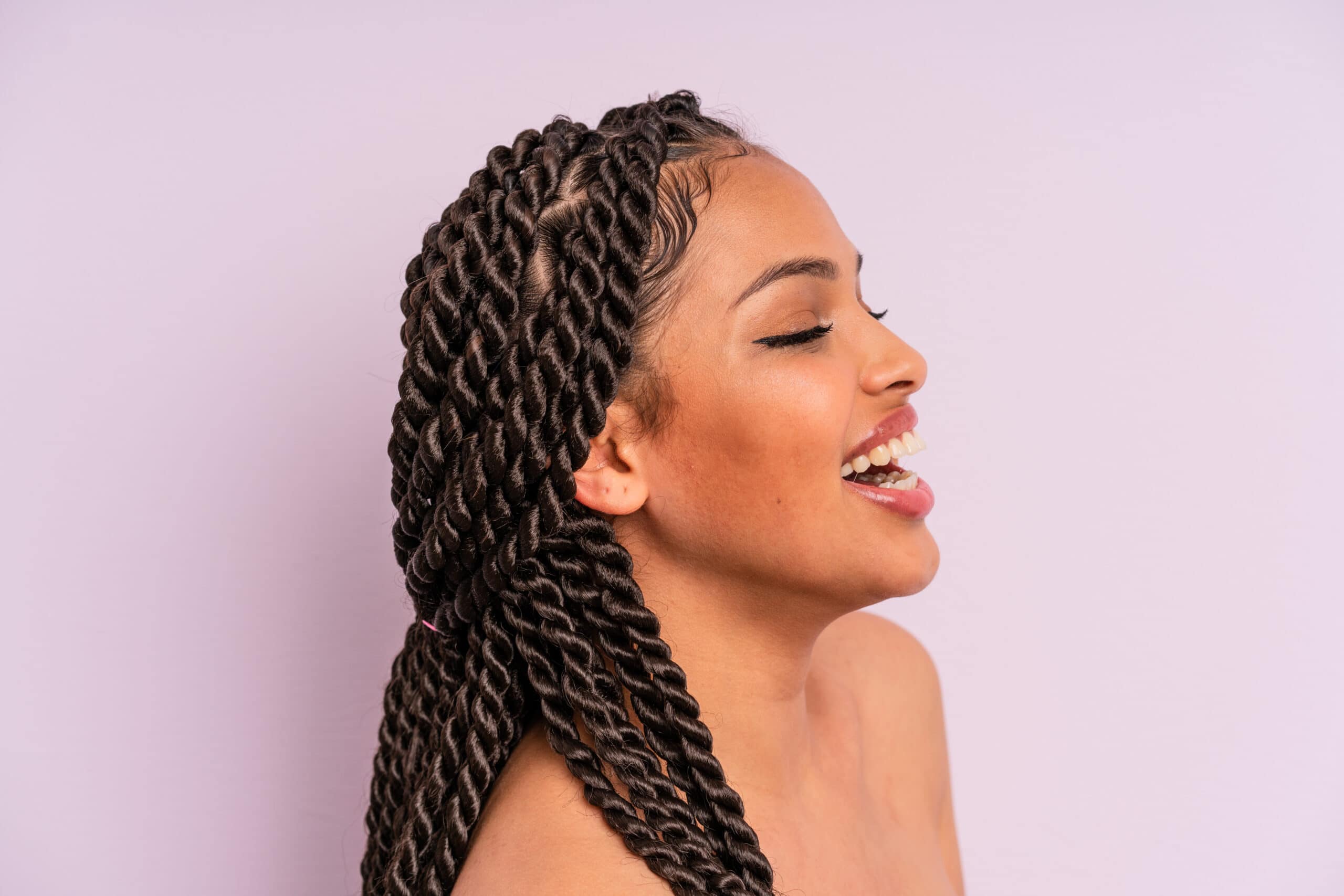 afro black woman with braids close up. beauty concept
