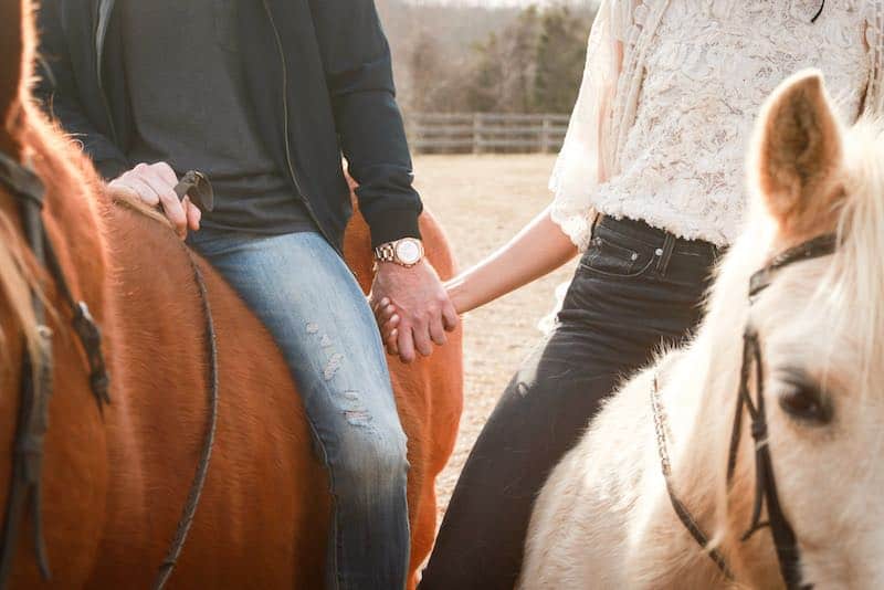 this is a picture of someone horse back riding