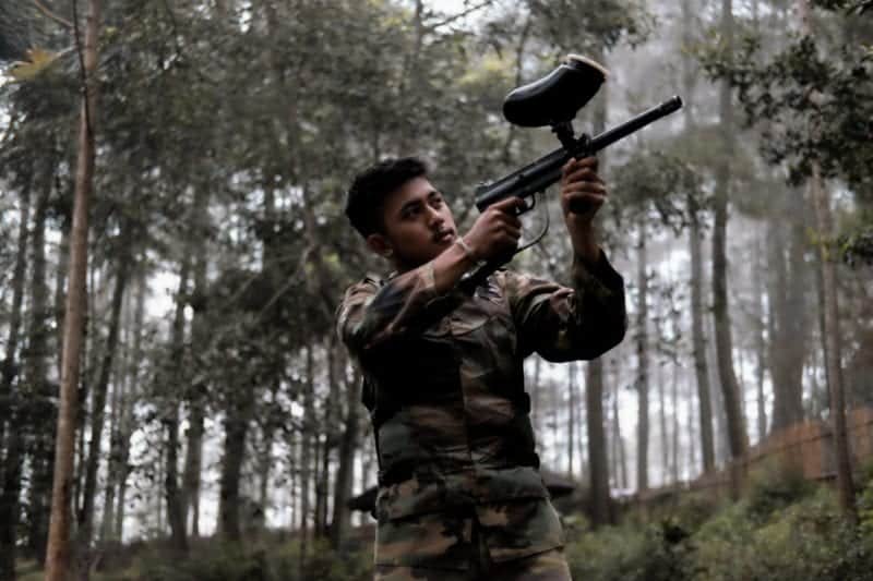 this is a picture of a of someone playing paintball