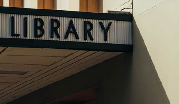 Modern library entrance at Northern Plains Public Library, showcasing community-focused library services and resources in a welcoming environment.
