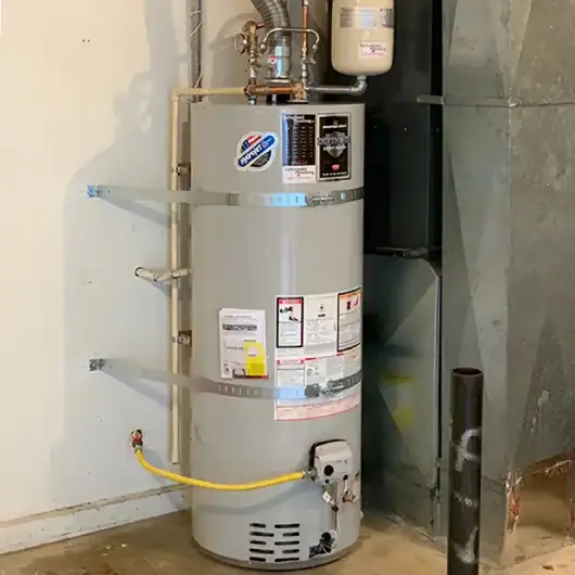 Residential-Gas-Water-Heater-With-Expansion-Tank-Installed-In-Basement