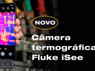 Imagem de um smartphone sendo usado com câmera termográfica Fluke iSee em um ambiente industrial, destacando a tecnologia de detecção térmica para manutenção e inspeções ambientais.