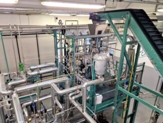 Extrator de gases industriais com tubulações de aço inox e sistema de monitoramento ambiental ambiente controlado para processos industriais seguros.