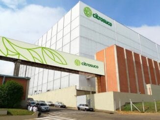 Citrosuco edifício industrial de produção de suco de frutas, destaque para logotipo e fachada moderna em ambiente corporativo sustentável.