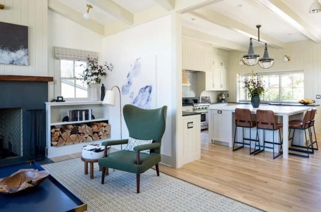 Modern kitchen and living room interior with fresh paint and stylish decor.