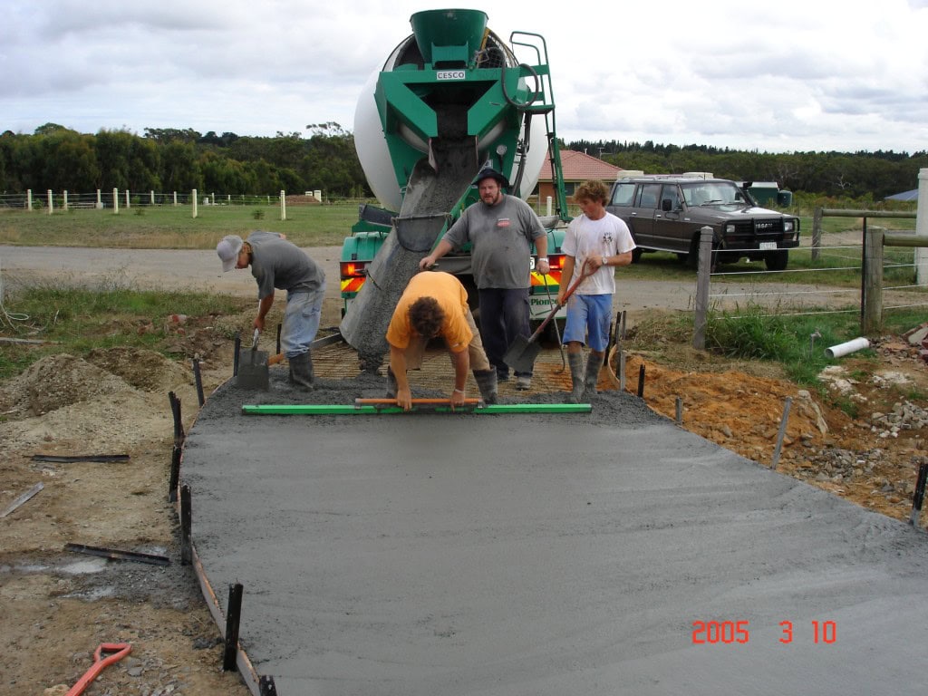 Concrete driveway being screeded