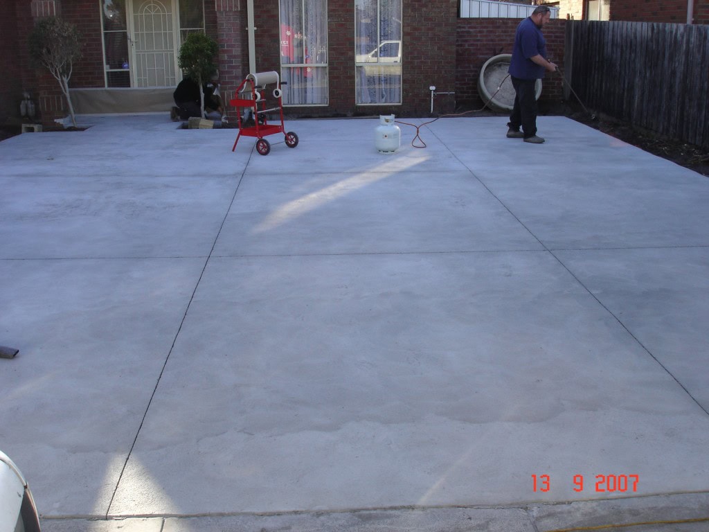 Plain concrete driveway before stencil concrete resurfacing Melbourne