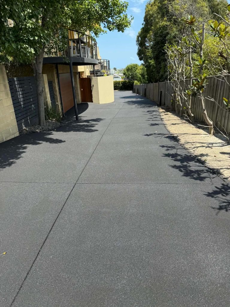 Concrete resurfacing driveway with blanket coat finish in Mornington