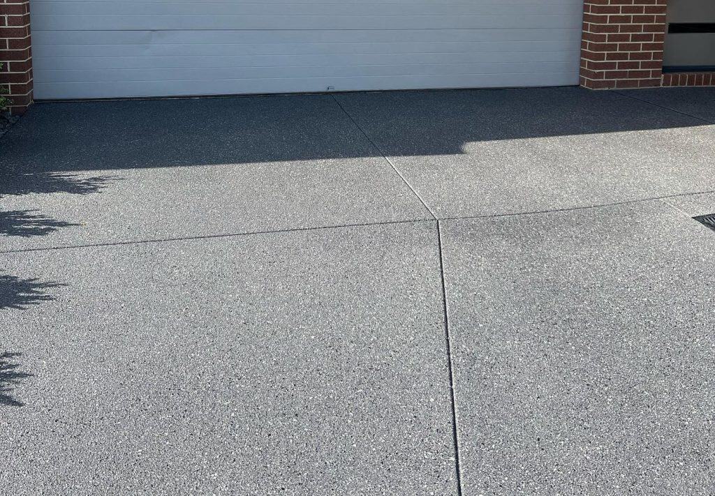 Exposed aggregate concrete resurfacing driveway in Clyde North