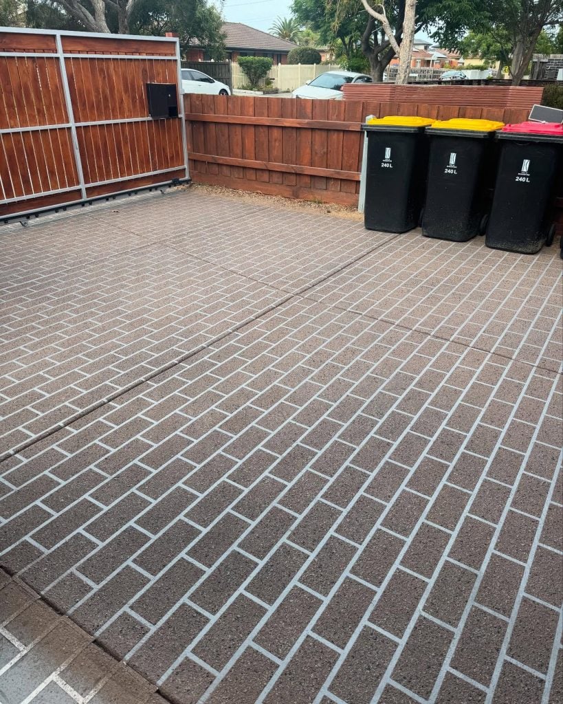 Brick stencil concrete resurfacing in Cheltenham showing a decorative paved brick pattern on an existing concrete driveway.