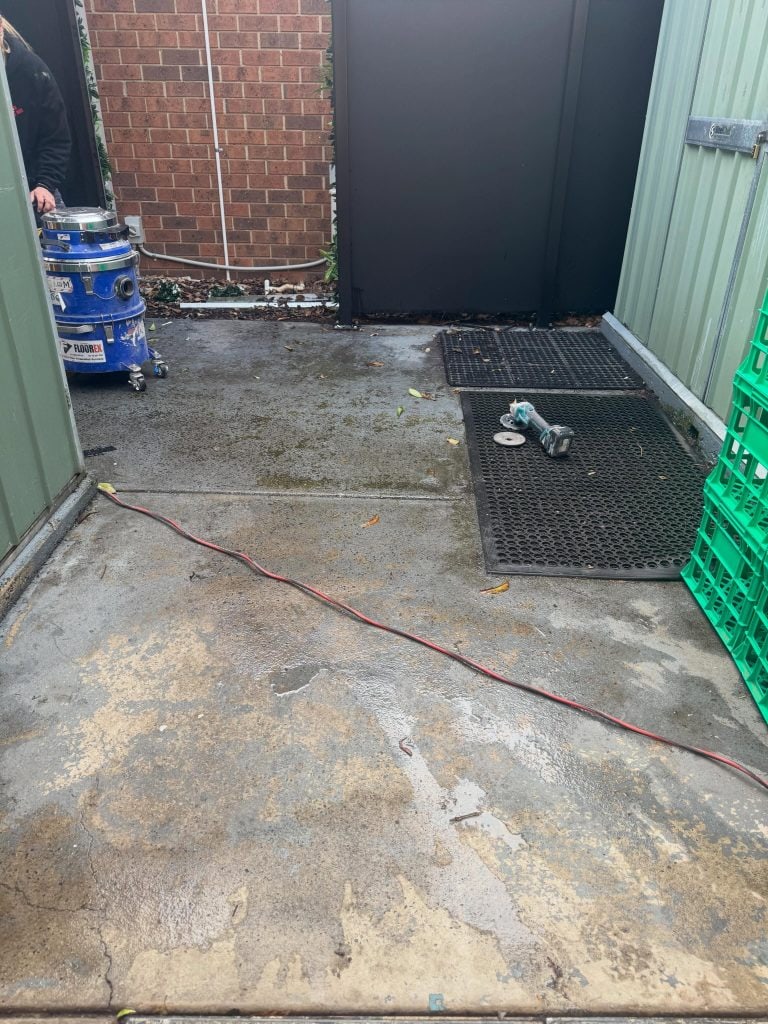 Before single colour concrete resurfacing at Bupa aged care facility in Bonbeach