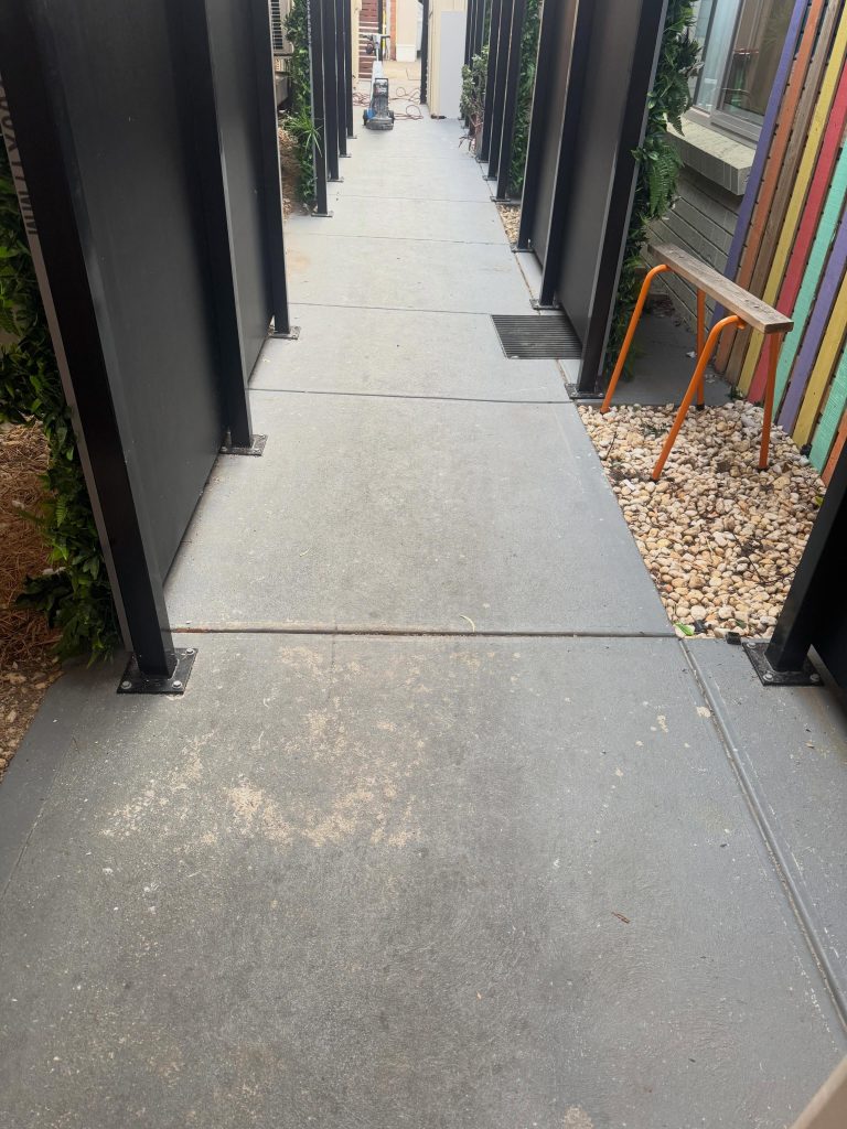 Single colour concrete resurfacing at Bupa aged care facility in Bonbeach
