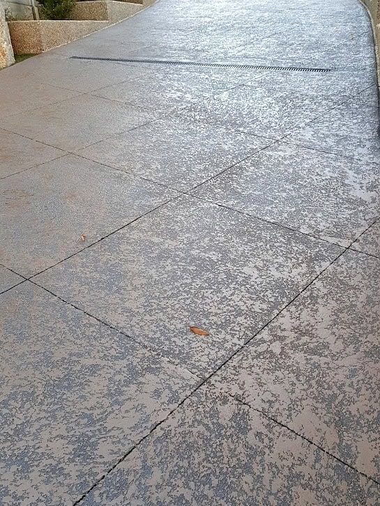 Cut stone concrete resurfacing Melbourne finished decorative driveway modern stone pattern