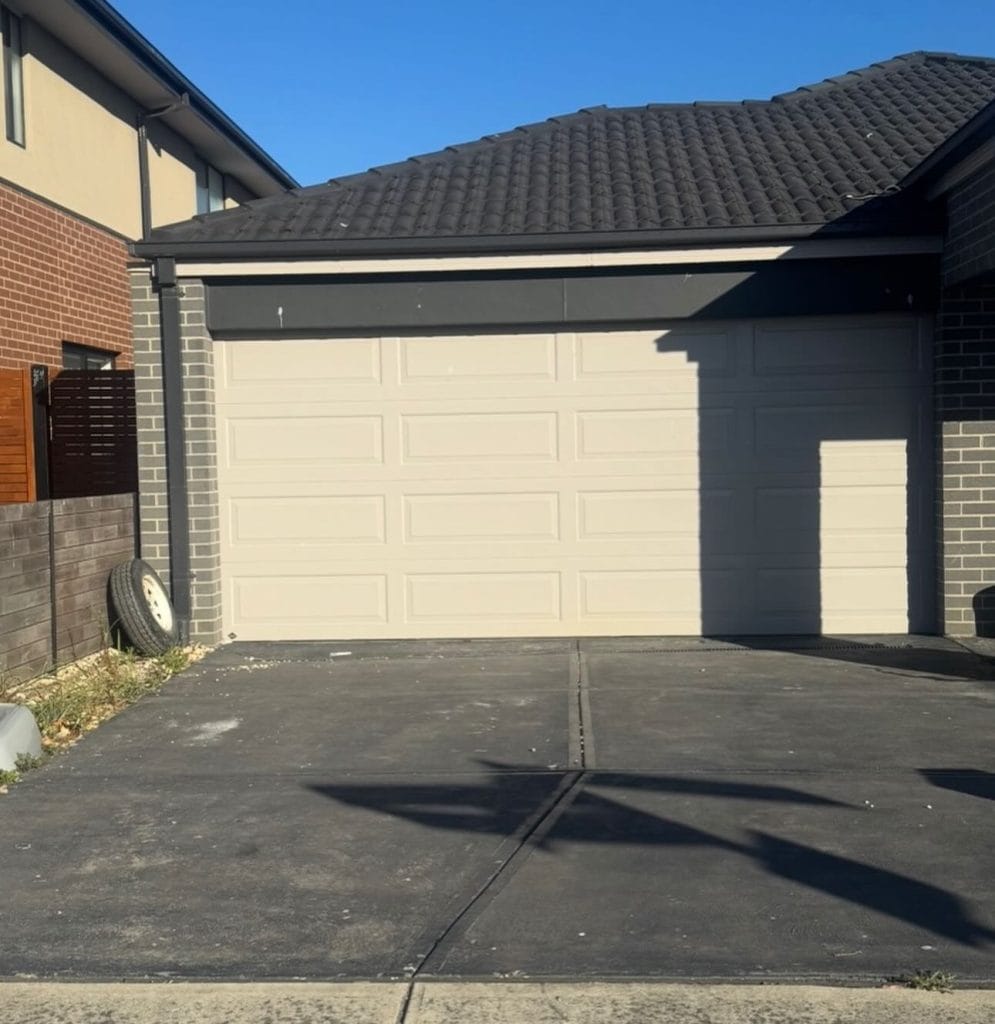 Concrete driveway before grinding and pressure cleaning Melbourne worn dirty surface