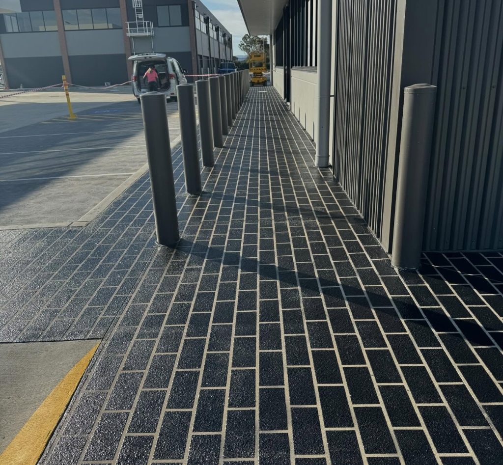 Stencil concrete resurfacing at Ampol service station Clyde North Melbourne