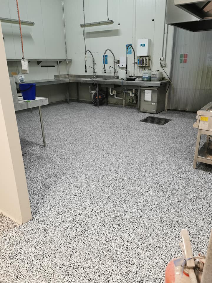 Commercial flake epoxy flooring in cafe kitchen