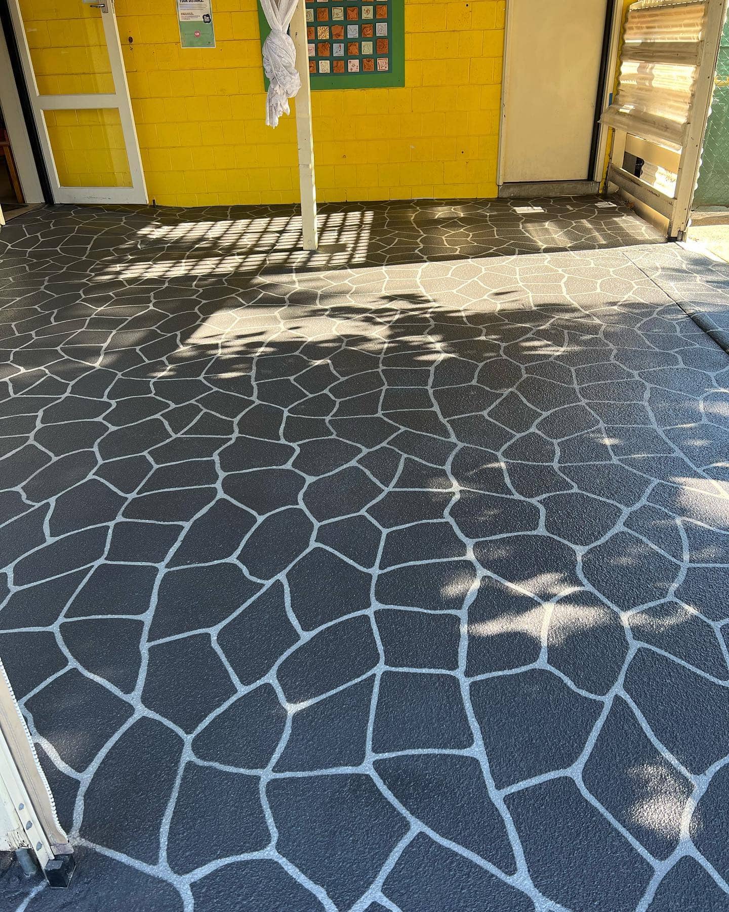 Brick pattern stencil concrete resurfacing