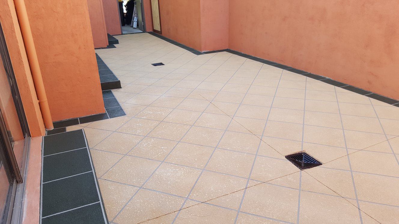 Stencil concrete resurfacing — tile pattern finish