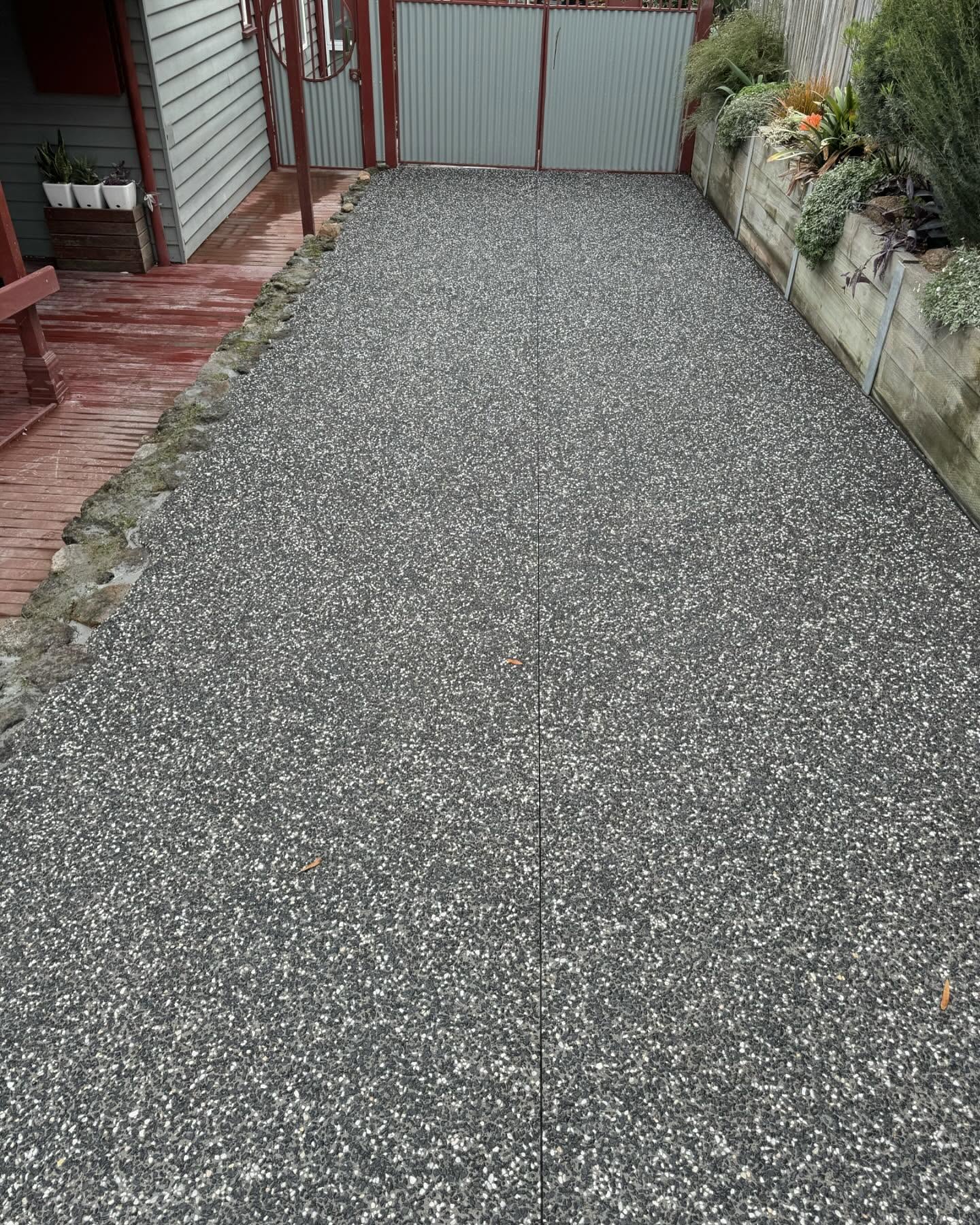 Resurfaced concrete with exposed aggregate finish