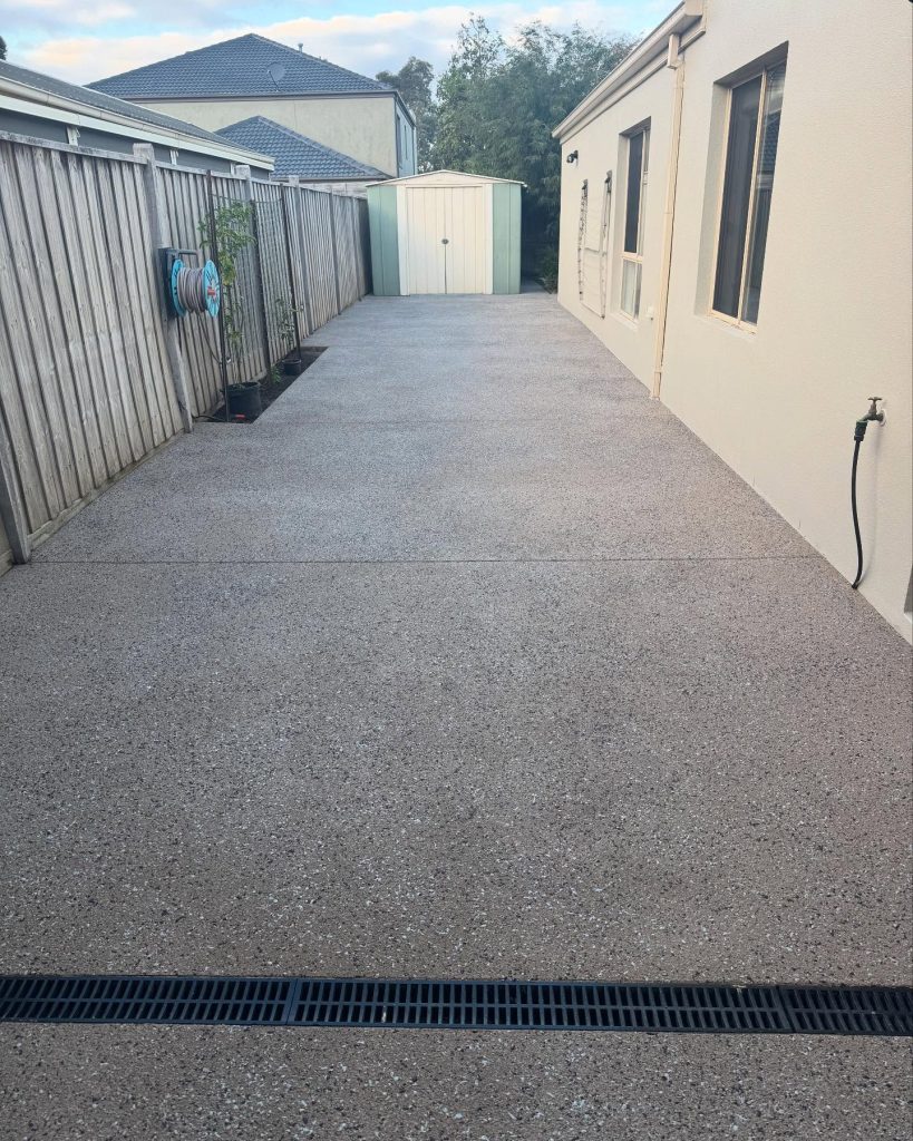 Concrete resurfacing side path and driveway after finish Melbourne