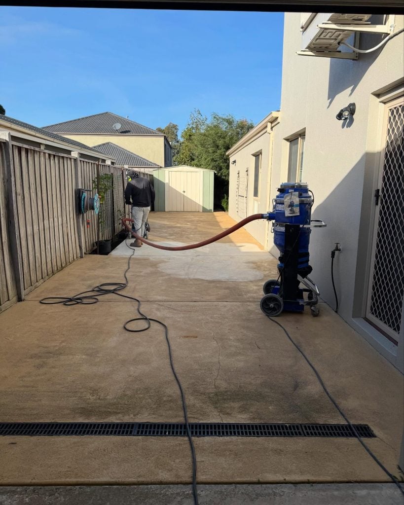 Concrete driveway pressure cleaning before resurfacing Melbourne