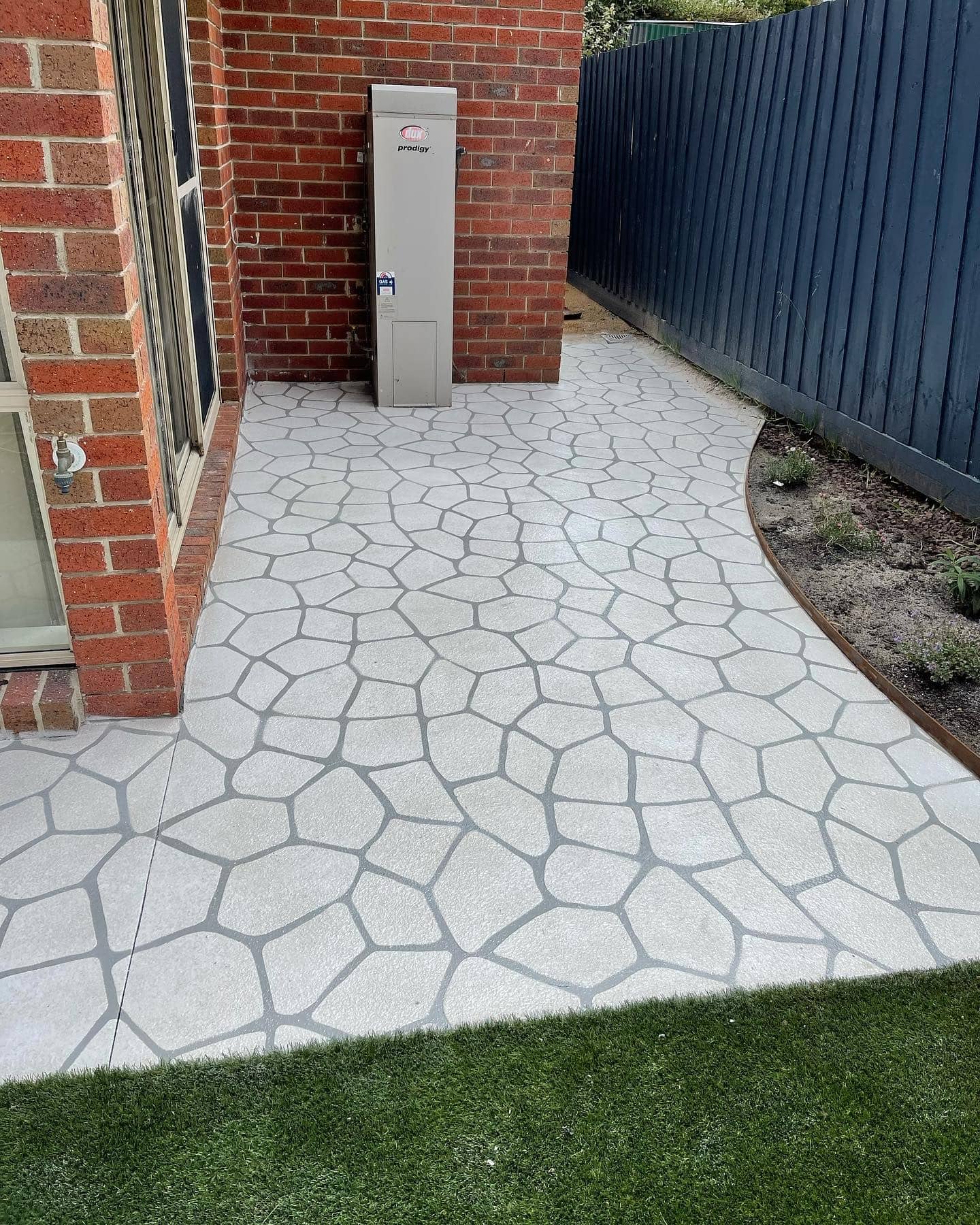 Brick pattern stencil concrete resurfacing