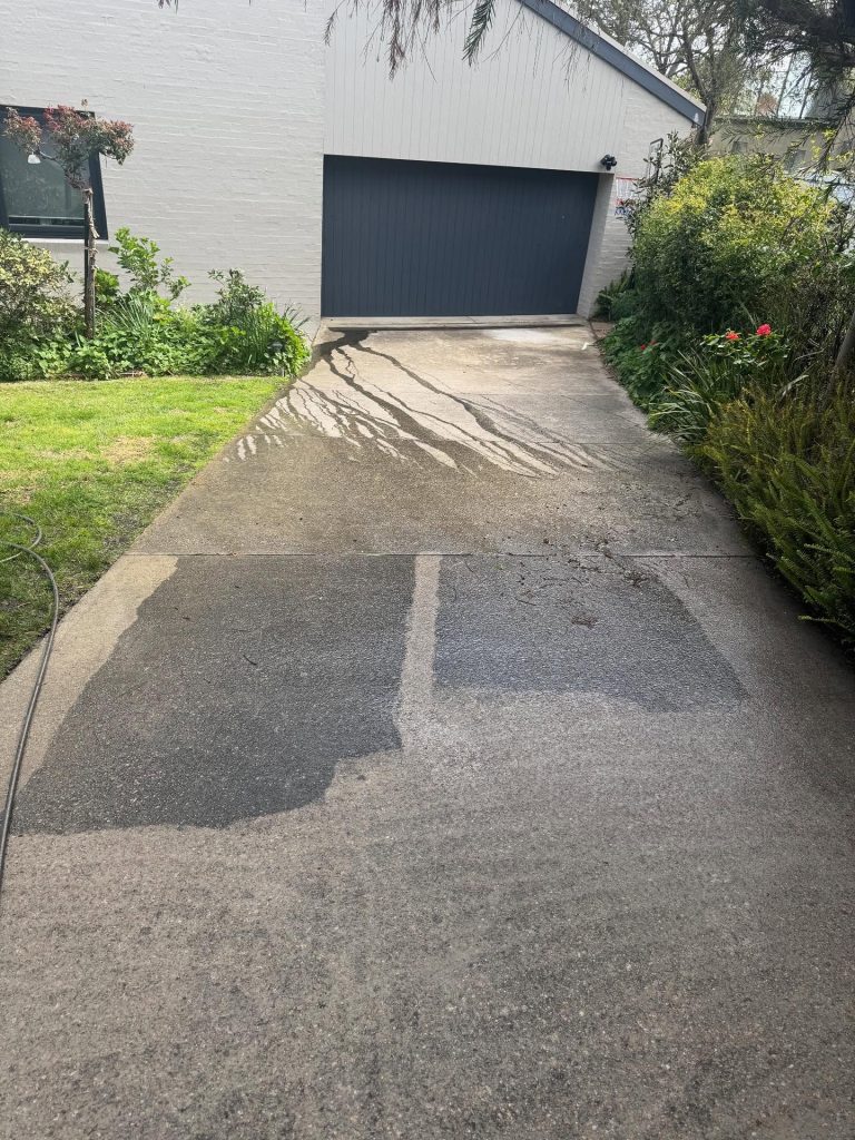 Before photo of worn concrete driveway in Mount Martha prior to concrete resurfacing and restoration
