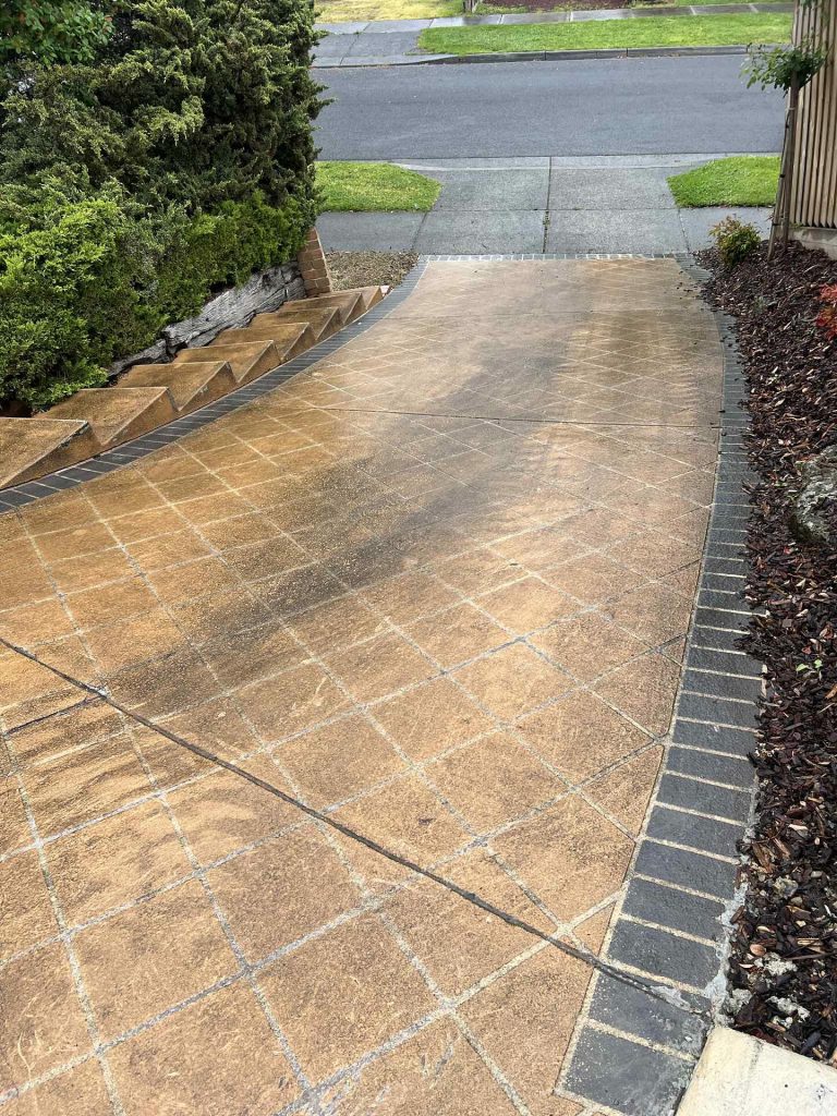 Before shot of steep concrete driveway in Mooroolbark with worn and slippery surface prior to exposed aggregate concrete resurfacing by Nupave