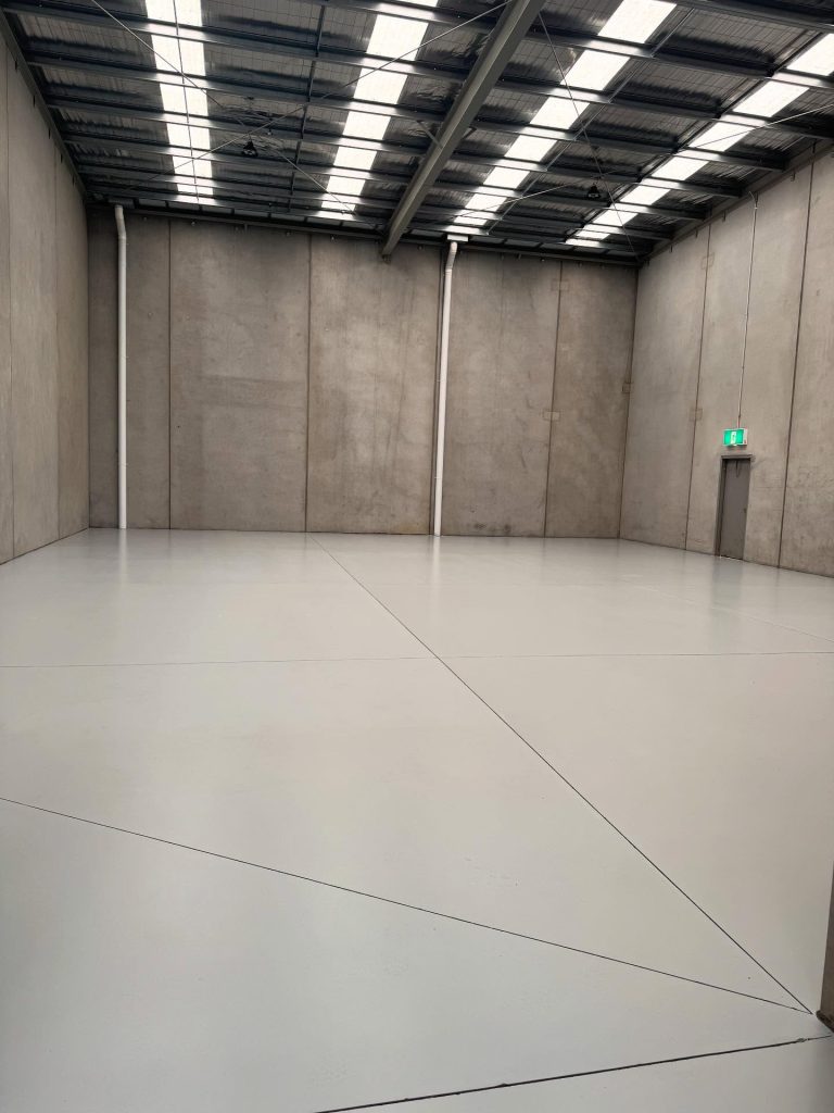 Factory floor after epoxy flooring installation in Melbourne