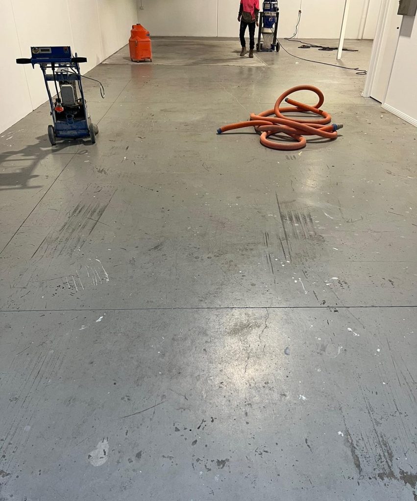 Before flake epoxy floor coating in commercial workspace