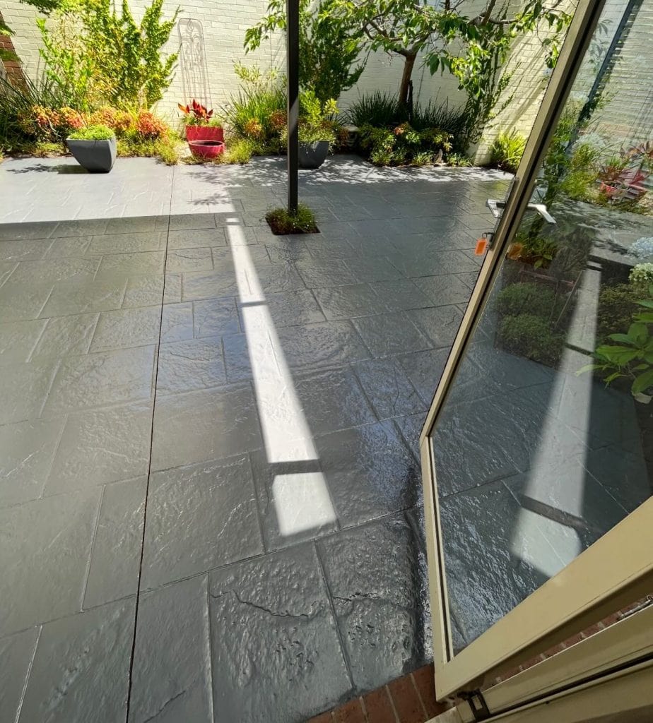 Concrete sealing in Heatherton on outdoor tiled concrete area