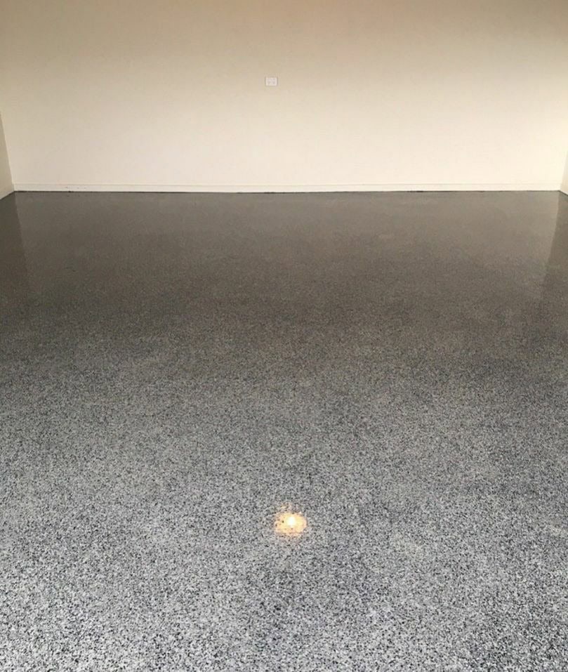 Grey flake epoxy garage floor coating in Clyde North Melbourne