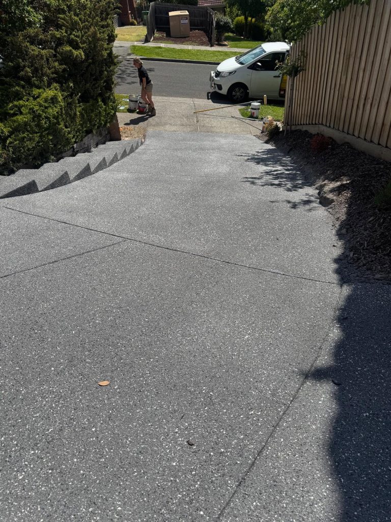 Exposed aggregate concrete resurfacing completed on steep driveway in Mooroolbark with improved slip resistance and modern finish