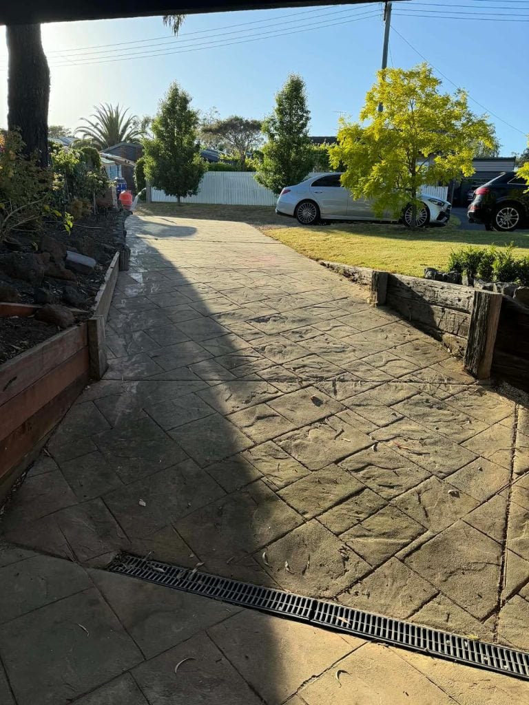 Before photo of steep sloping driveway in Mount Eliza prior to concrete resurfacing and non-slip restoration