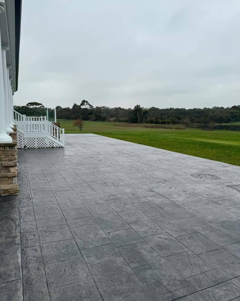 Slate impression concrete entertainment area sealed with matte finish