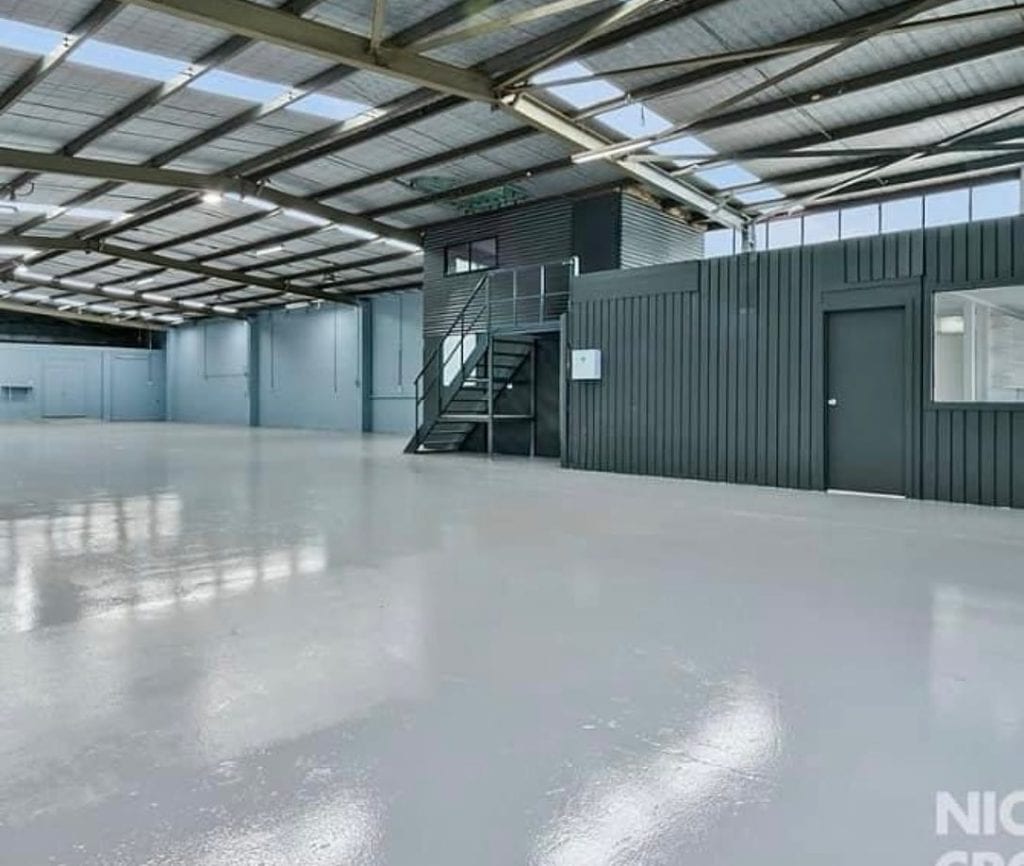 Factory epoxy floor after professional concrete grinding in Melbourne