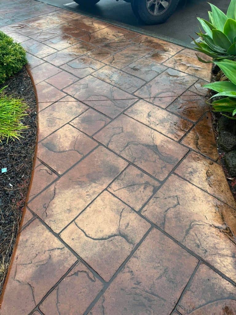 Slate impression concrete installed in 1993 still holding up well outdoors.