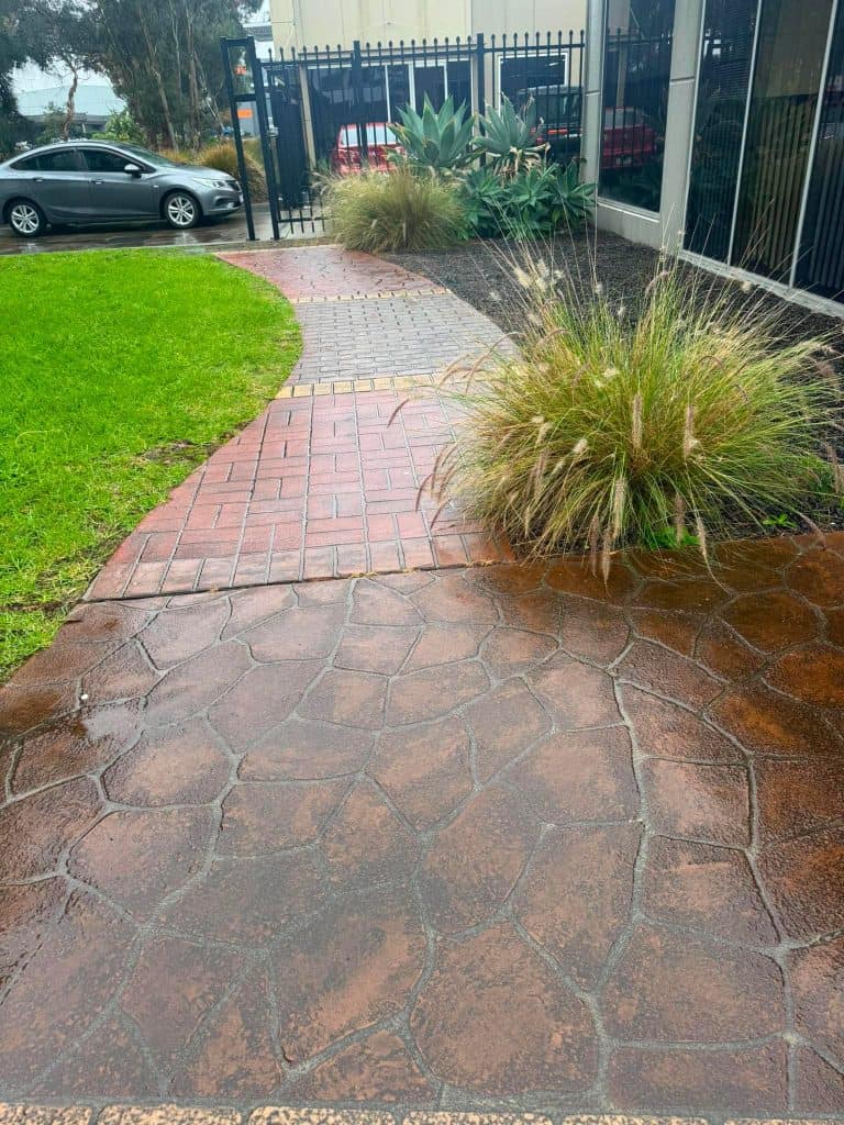 Stencilled concrete installed in 1993 still holding up well outdoors.