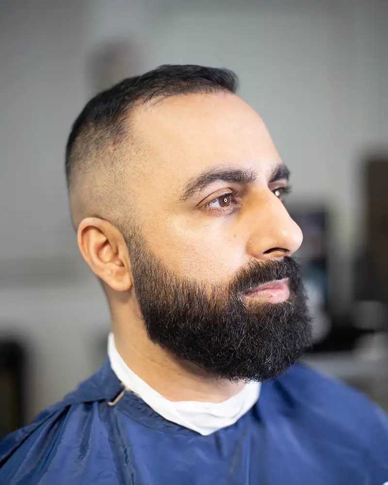A beard lineup at a barberhsop near alondra park near 90260