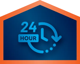 Blue 24-hour clock icon inside an orange-edged house-shaped frame, symbolizing around-the-clock service or availability.